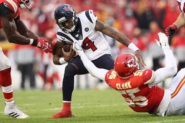Deshaun Watson getting tackled by a Chiefs player