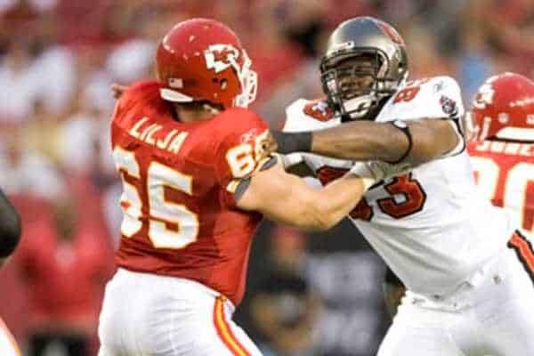 Kansas City Chiefs player battling a Tampa Bay player
