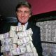 Trump with stacks of cash