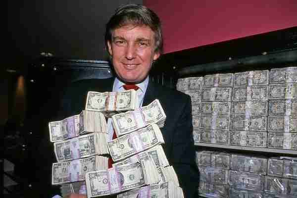 Trump with stacks of cash