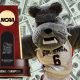 Gonzaga Bulldog with national championship in front of cash won by betting on March Madness odds