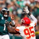 Christopher Jones of the Kansas City Chiefs trying to sack Jalen Hurts of the Philadelphia Eagles